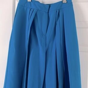 Extra wide calf length trousers in a vivid island blue ready for work or play!